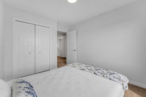 97 Corner Glen Way Ne, Calgary, AB - Indoor Photo Showing Bedroom
