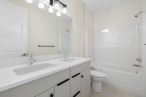 112 Sunrise Heath, Cochrane, AB - Indoor Photo Showing Bathroom