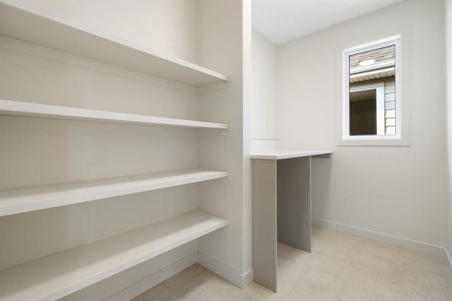 112 Sunrise Heath, Cochrane, AB - Indoor With Storage