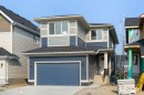112 Sunrise Heath, Cochrane, AB  - Outdoor With Facade 