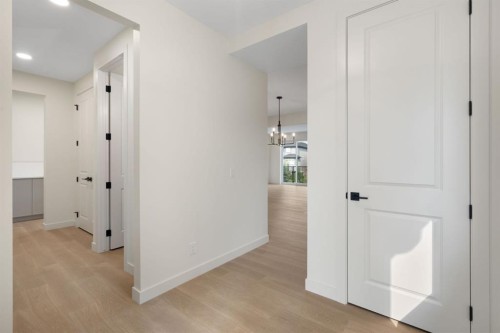 112 Sunrise Heath, Cochrane, AB - Indoor Photo Showing Other Room