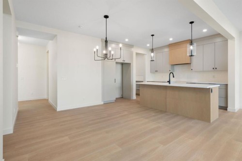 112 Sunrise Heath, Cochrane, AB - Indoor Photo Showing Kitchen