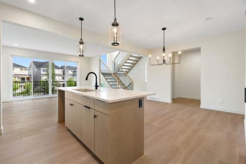 112 Sunrise Heath, Cochrane, AB - Indoor Photo Showing Kitchen