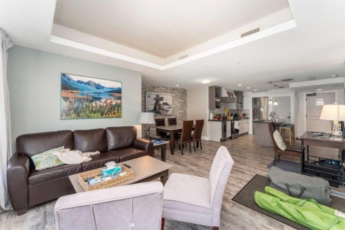 213-173 Kananaskis Way, Canmore, AB - Indoor Photo Showing Living Room
