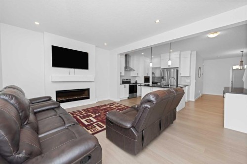 328 Homestead Grove Ne, Calgary, AB - Indoor Photo Showing Living Room With Fireplace