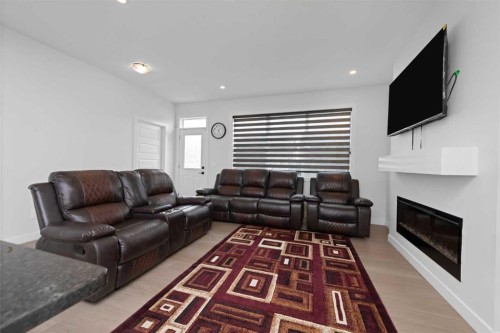 328 Homestead Grove Ne, Calgary, AB - Indoor Photo Showing Living Room With Fireplace