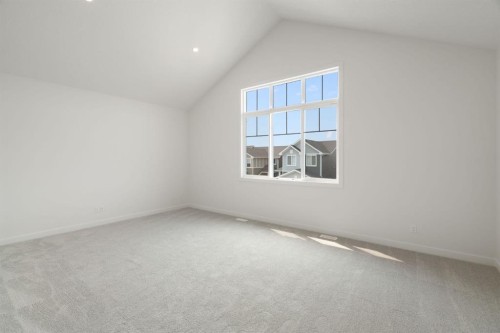 116 Sunrise Heath, Cochrane, AB - Indoor Photo Showing Other Room