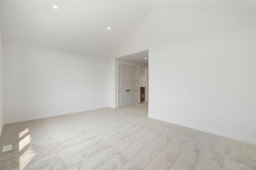 116 Sunrise Heath, Cochrane, AB - Indoor Photo Showing Other Room
