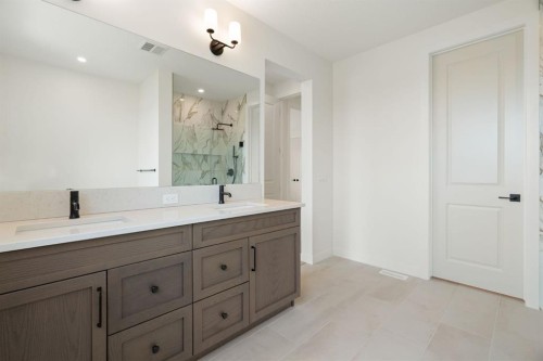 116 Sunrise Heath, Cochrane, AB - Indoor Photo Showing Bathroom