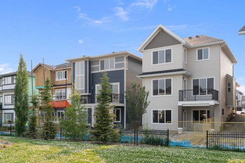 116 Sunrise Heath, Cochrane, AB - Outdoor With Facade
