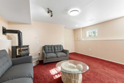 331 Coverdale Court Ne, Calgary, AB - Indoor Photo Showing Living Room With Fireplace