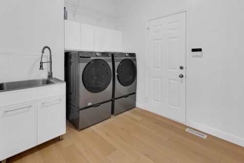 99 Edgeridge View Nw, Calgary, AB - Indoor Photo Showing Laundry Room