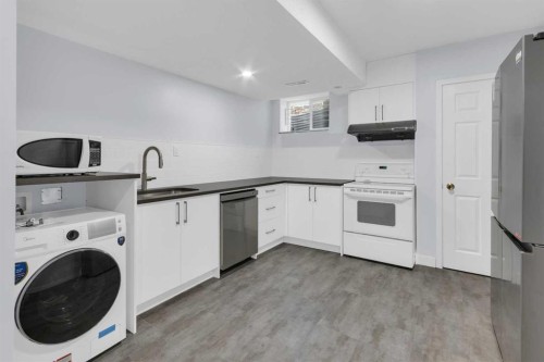 99 Edgeridge View Nw, Calgary, AB - Indoor Photo Showing Laundry Room