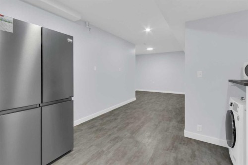 99 Edgeridge View Nw, Calgary, AB - Indoor Photo Showing Laundry Room