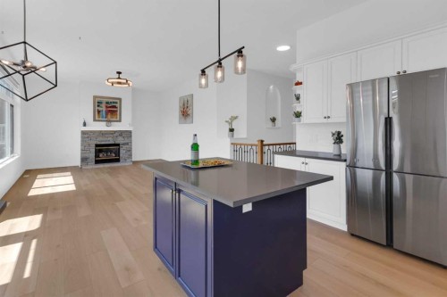 99 Edgeridge View Nw, Calgary, AB - Indoor Photo Showing Other Room With Fireplace