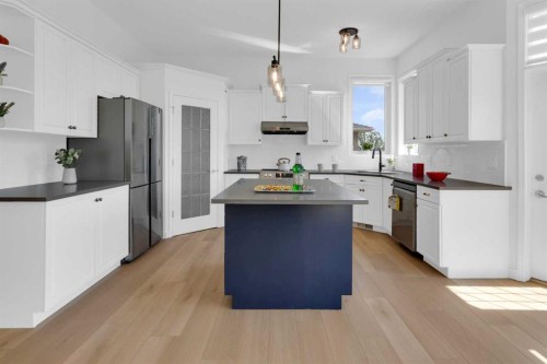99 Edgeridge View Nw, Calgary, AB - Indoor Photo Showing Kitchen With Upgraded Kitchen