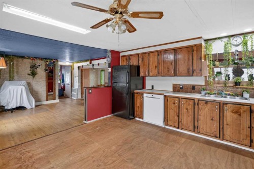 224 Huntwell Road Ne, Calgary, AB - Indoor Photo Showing Kitchen With Double Sink