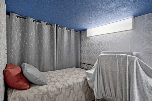 224 Huntwell Road Ne, Calgary, AB - Indoor Photo Showing Bedroom