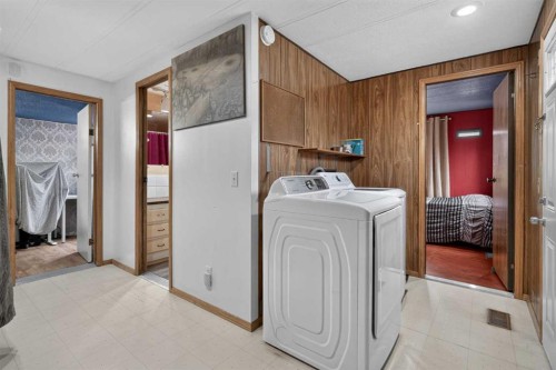 224 Huntwell Road Ne, Calgary, AB - Indoor Photo Showing Laundry Room