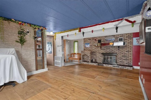 224 Huntwell Road Ne, Calgary, AB - Indoor With Fireplace