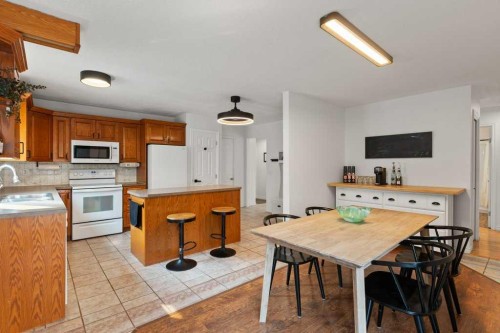 167 Deerpath Court Se, Calgary, AB - Indoor Photo Showing Kitchen With Double Sink