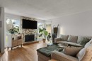 167 Deerpath Court Se, Calgary, AB  - Indoor Photo Showing Living Room With Fireplace 