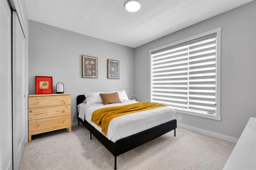 426 Shawnee Square Sw, Calgary, AB - Indoor Photo Showing Bedroom