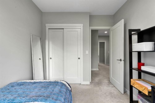 426 Shawnee Square Sw, Calgary, AB - Indoor Photo Showing Bedroom