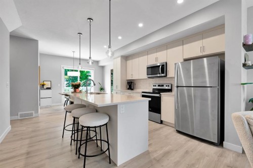 426 Shawnee Square Sw, Calgary, AB - Indoor Photo Showing Kitchen With Stainless Steel Kitchen With Upgraded Kitchen