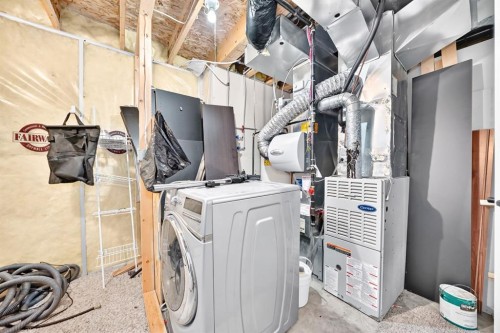 262 Coventry Court Ne, Calgary, AB - Indoor Photo Showing Laundry Room
