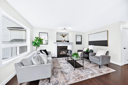 262 Coventry Court Ne, Calgary, AB - Indoor Photo Showing Living Room With Fireplace