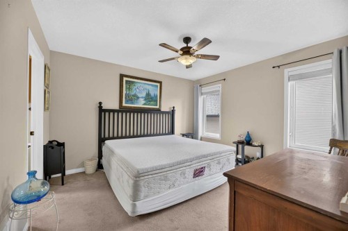 41 Deer Coulee Drive, Didsbury, AB - Indoor Photo Showing Bedroom