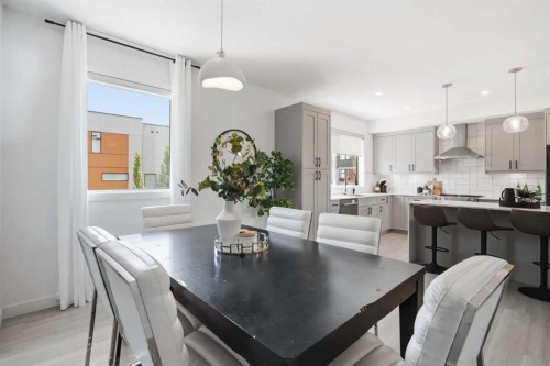 108 Na'A Heights Sw, Calgary, AB - Indoor Photo Showing Dining Room