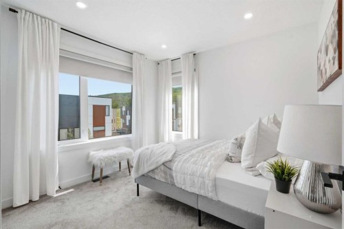 108 Na'A Heights Sw, Calgary, AB - Indoor Photo Showing Bedroom