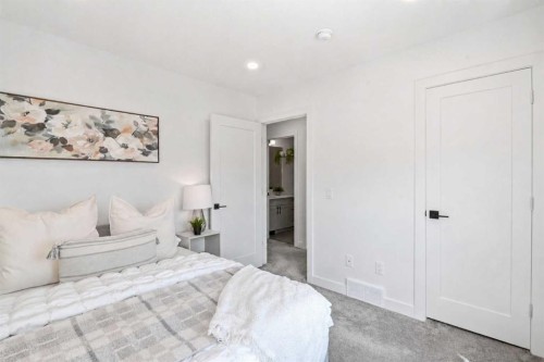 108 Na'A Heights Sw, Calgary, AB - Indoor Photo Showing Bedroom
