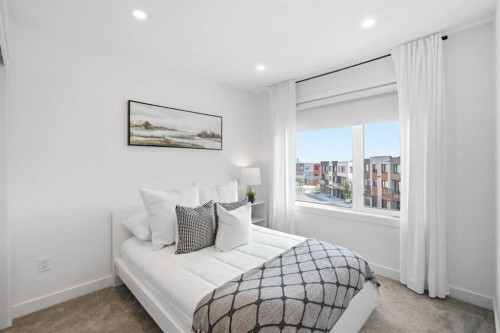 108 Na'A Heights Sw, Calgary, AB - Indoor Photo Showing Bedroom