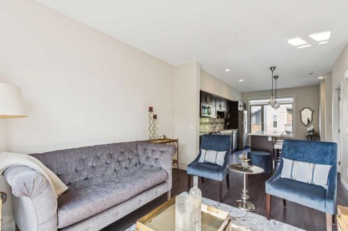 16 Westpark Common Sw, Calgary, AB - Indoor Photo Showing Living Room