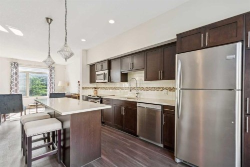 16 Westpark Common Sw, Calgary, AB - Indoor Photo Showing Kitchen With Upgraded Kitchen