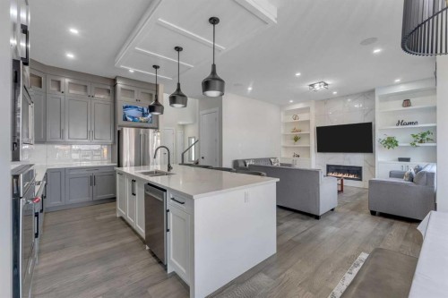 32 Waterford Terrace, Chestermere, AB - Indoor Photo Showing Kitchen With Double Sink With Upgraded Kitchen