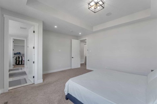 32 Waterford Terrace, Chestermere, AB - Indoor Photo Showing Bedroom