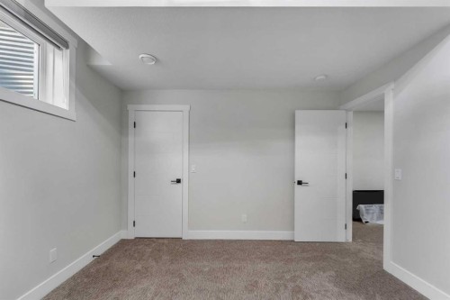32 Waterford Terrace, Chestermere, AB - Indoor Photo Showing Other Room