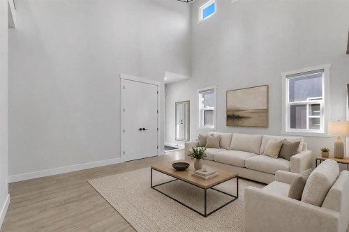 32 Waterford Terrace, Chestermere, AB - Indoor Photo Showing Living Room