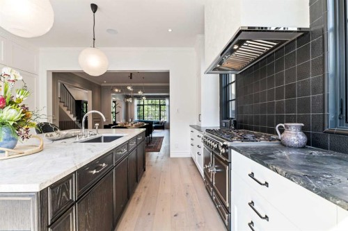 82 Valour Circle Sw, Calgary, AB - Indoor Photo Showing Kitchen With Upgraded Kitchen