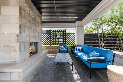 82 Valour Circle Sw, Calgary, AB -  With Fireplace With Exterior