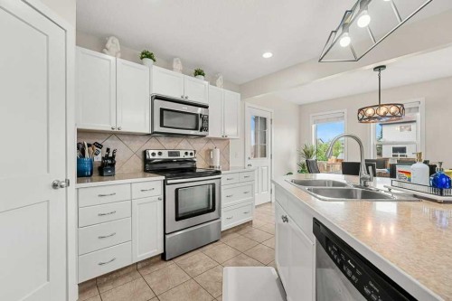 13061 Coventry Hills Way Ne, Calgary, AB - Indoor Photo Showing Kitchen With Stainless Steel Kitchen With Double Sink With Upgraded Kitchen