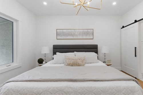 12 Prominence Point Sw, Calgary, AB - Indoor Photo Showing Bedroom
