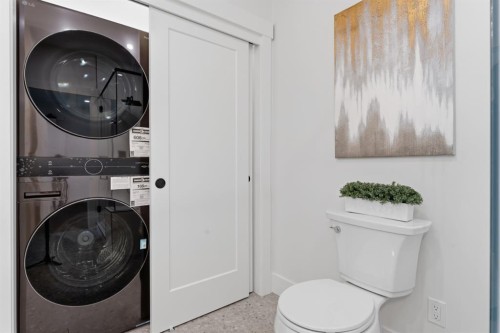 12 Prominence Point Sw, Calgary, AB - Indoor Photo Showing Laundry Room
