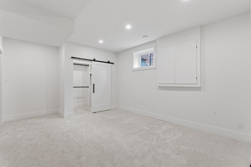 12 Prominence Point Sw, Calgary, AB - Indoor Photo Showing Other Room