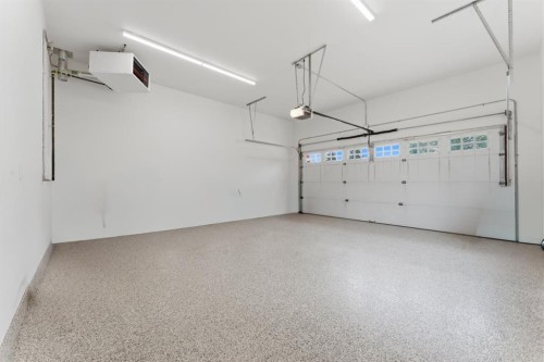 12 Prominence Point Sw, Calgary, AB - Indoor Photo Showing Garage