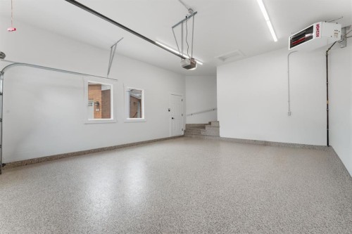 12 Prominence Point Sw, Calgary, AB - Indoor Photo Showing Garage